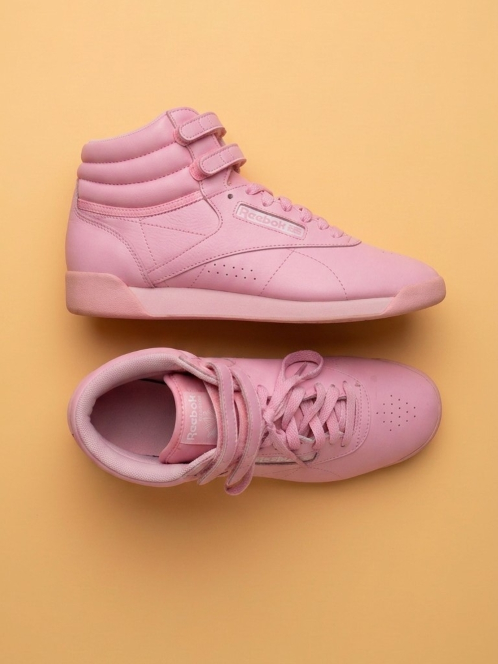 Reebok Women’s Pastel Pink High-Top Sneakers